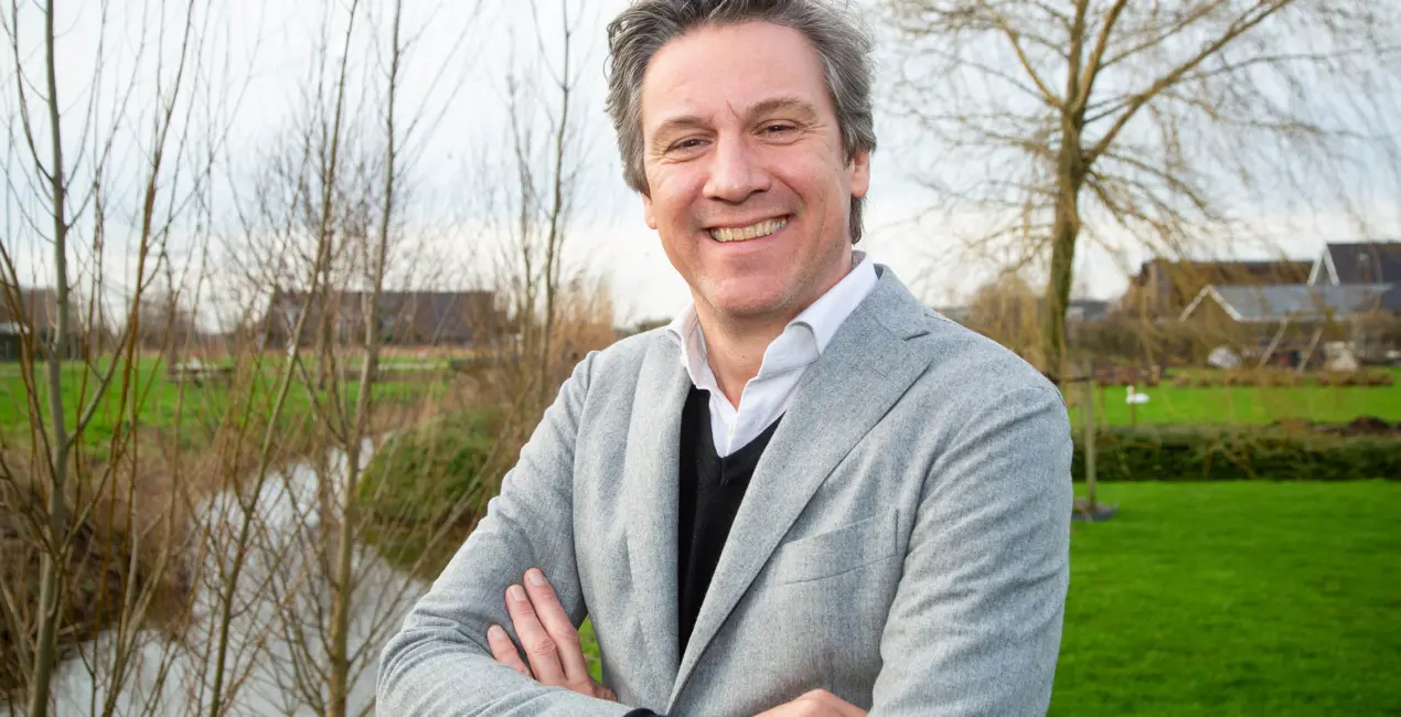 Portretfoto van Vewin voorzitter Pieter Litjens